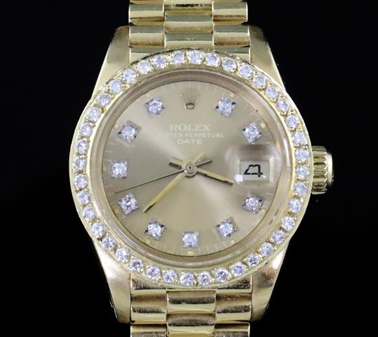 A ladys 1980s? 18ct gold and diamond set Rolex Oyster Perpetual Date wristwatch, on 18ct Rolex bracelet with deployment clasp,